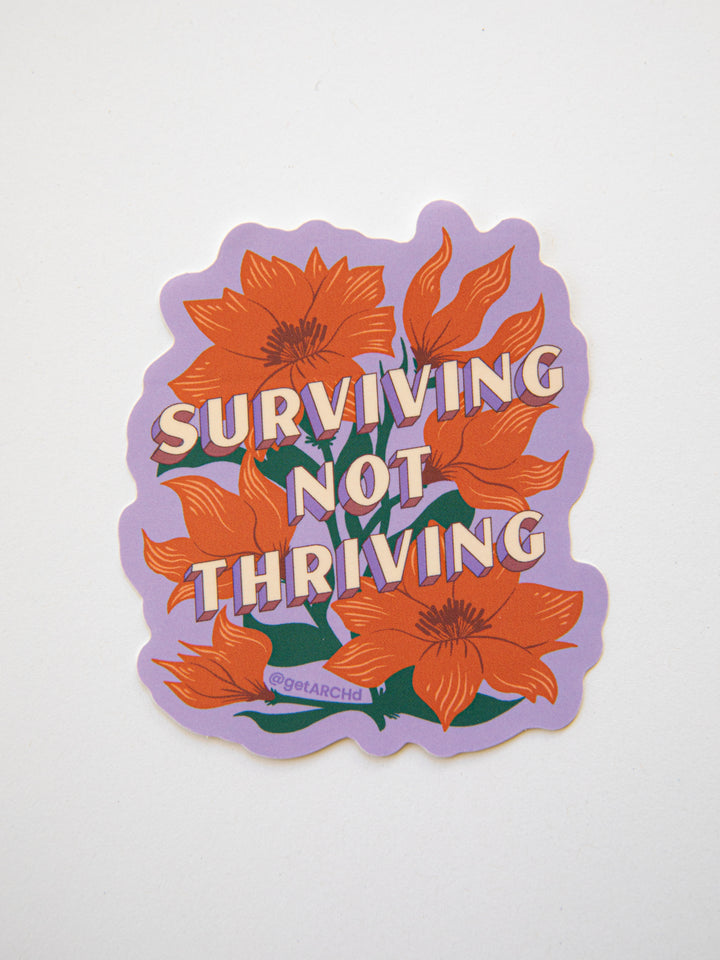 Surviving not thriving floral sticker on white background