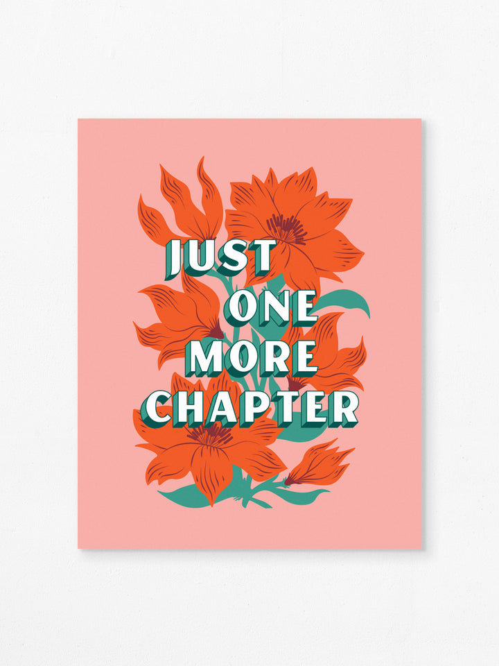Flat art print on white background. Features bookish saying, "Just one more chapter," over orange wildflower illustration on pink background.
