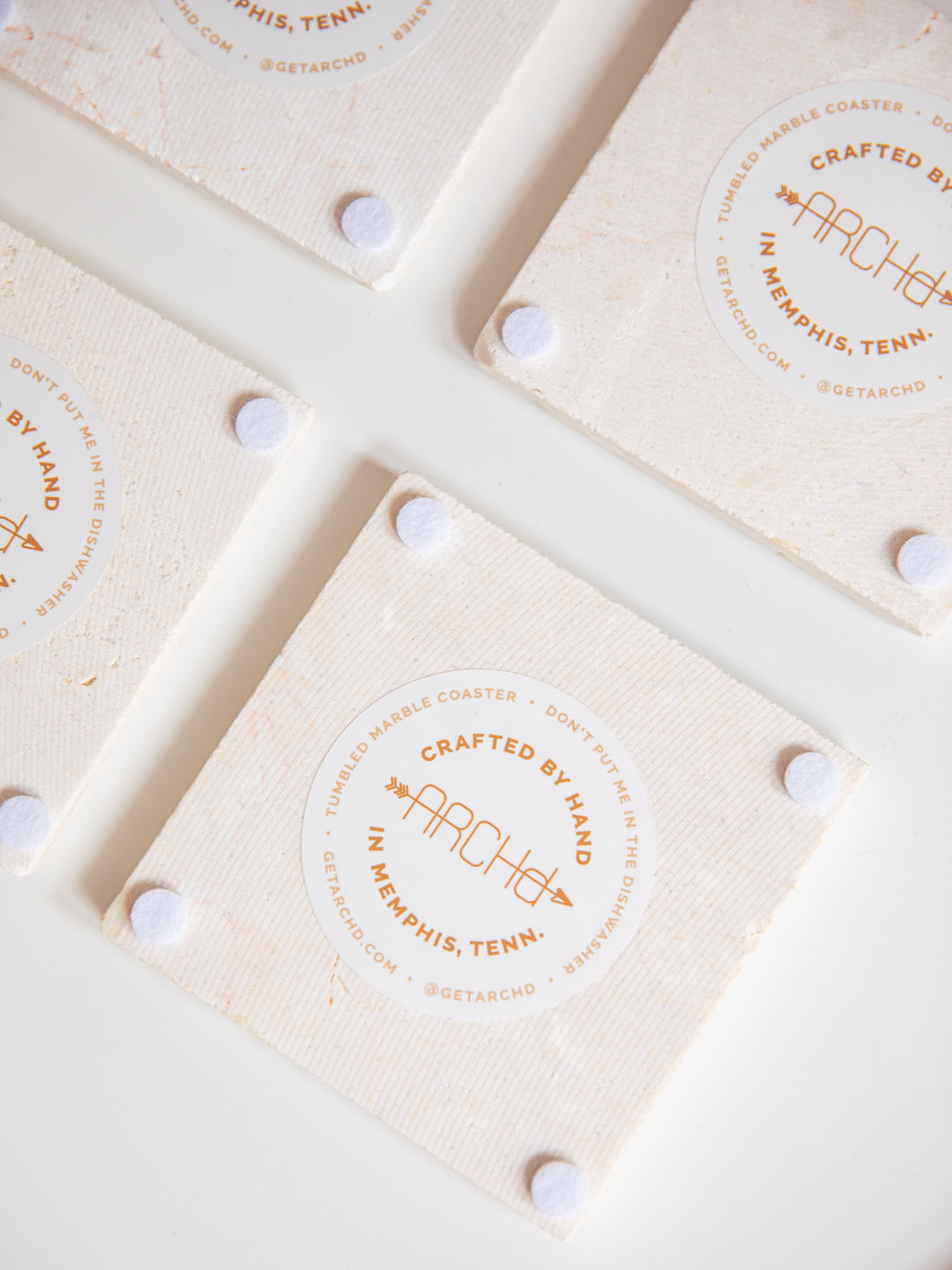 ARCHd branded sticker and felt backers for marble coaster set