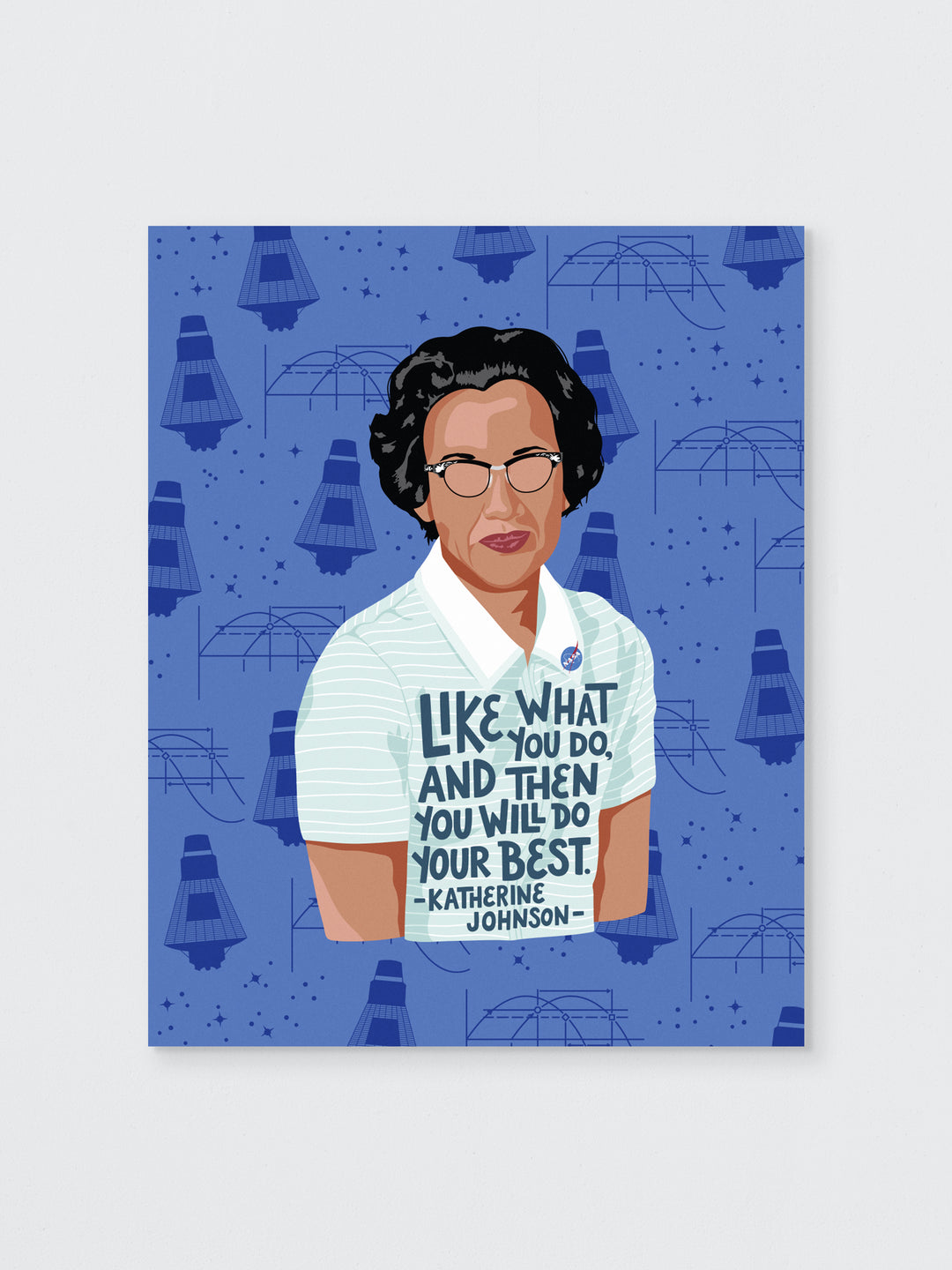 Wall print of Katherine Johnson on blue background with a space themed pattern. Her quote across her chest "Like what you do, and then you will do your best." Katherine Johnson art