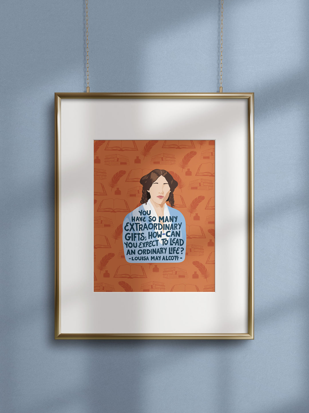 Large poster print of Louisa May Alcott on orange background. Framed, matted, and hanged on a blue wall. Louisa May Alcott gifts