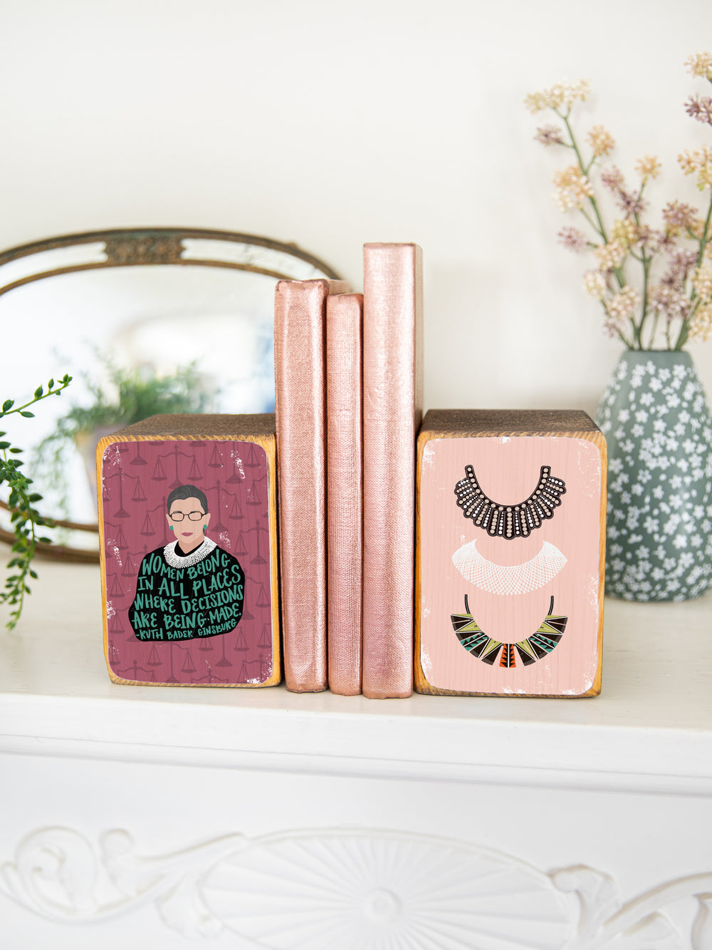 Ruth Bader Ginsburg art. bookend set on mantle holding up books