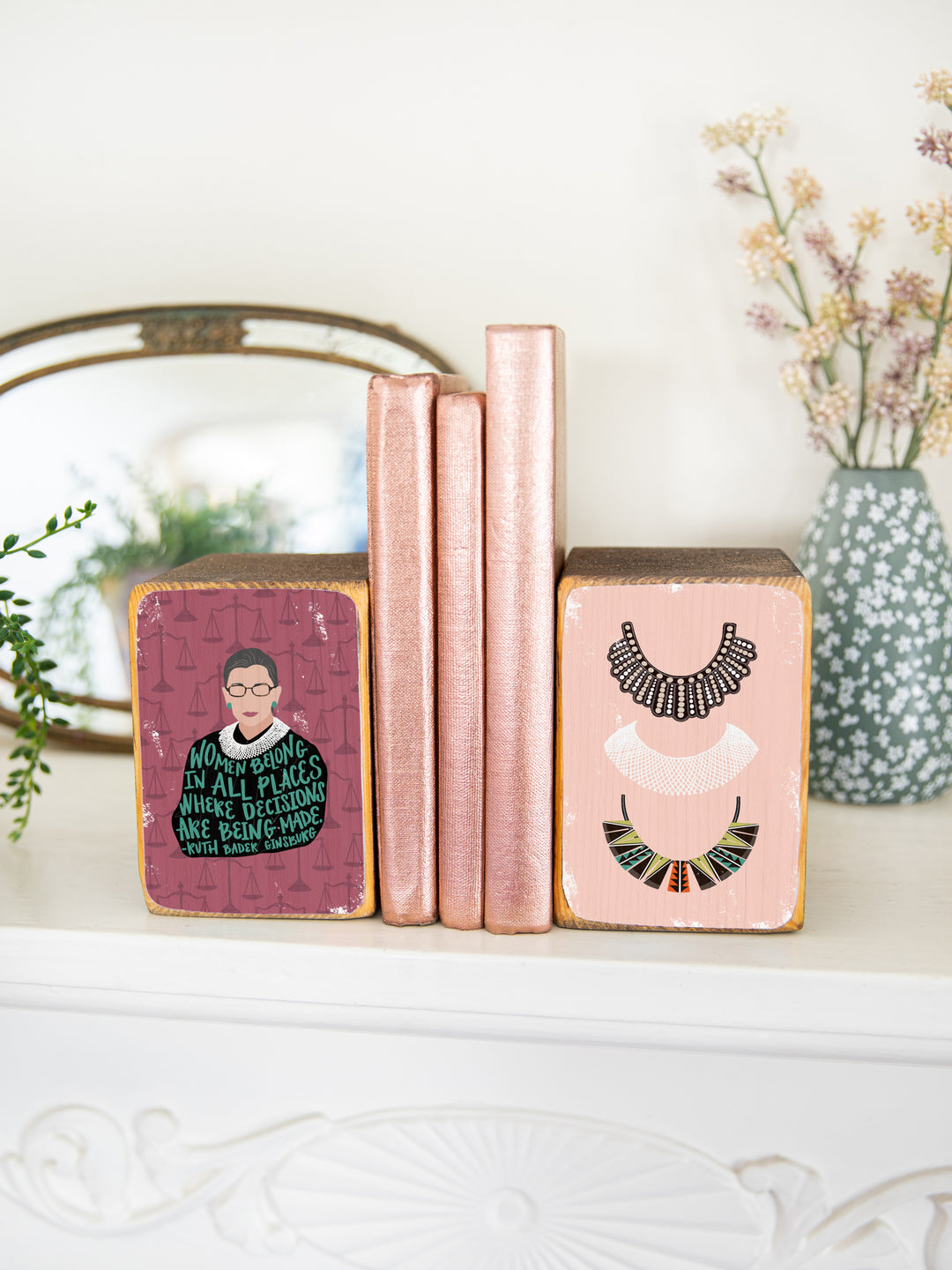 Ruth Bader Ginsburg art. bookend set on mantle holding up books