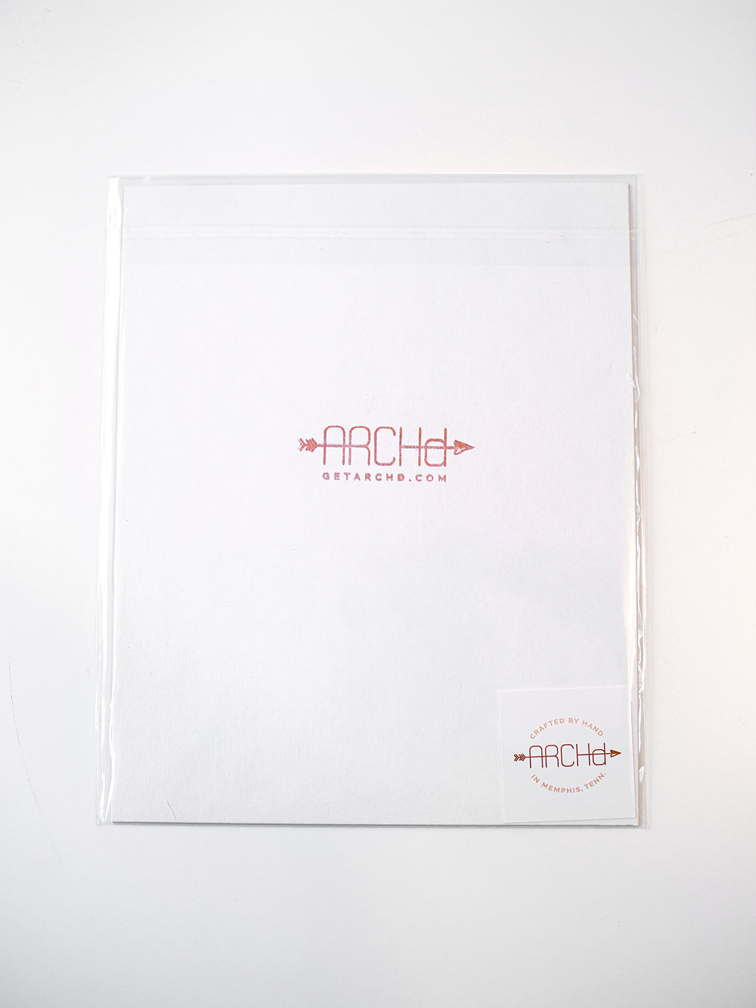 ARCHd art print packaging in a clear sleeve