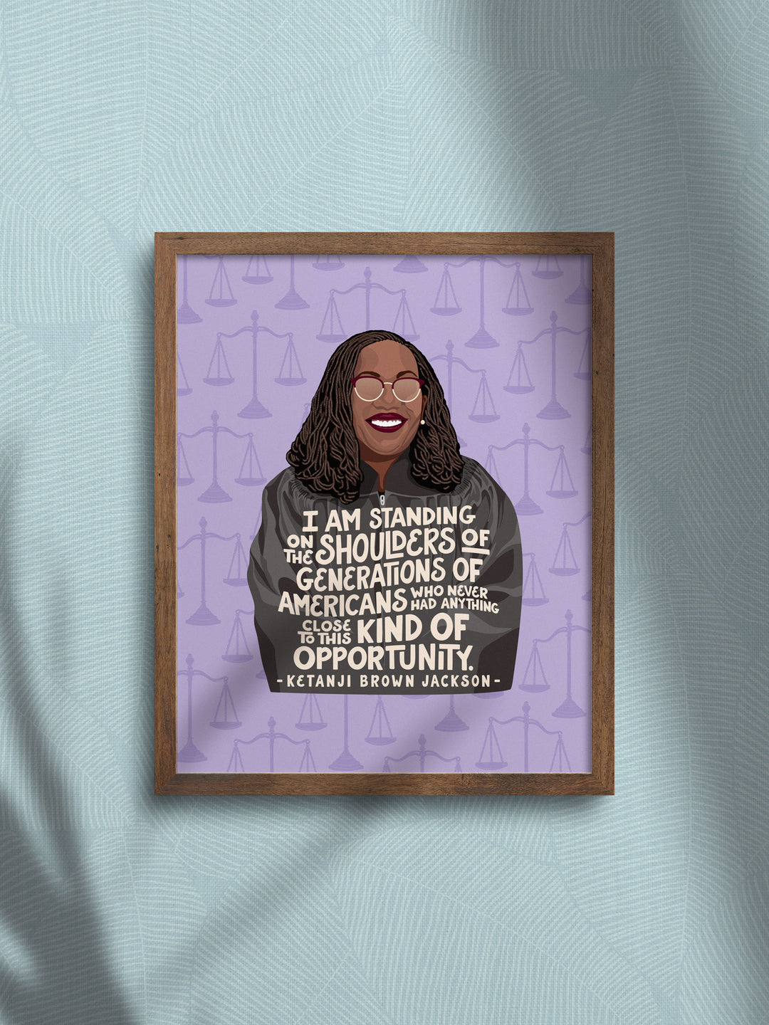 Ketanji Brown Jackson 8x10 art print framed on a blue wall. Ketanji Brown Jackson art