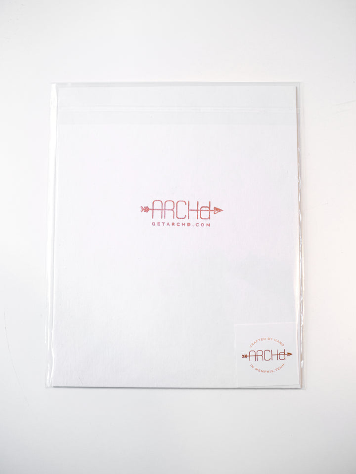 Art print packaging in clear bag with ARCHd branding