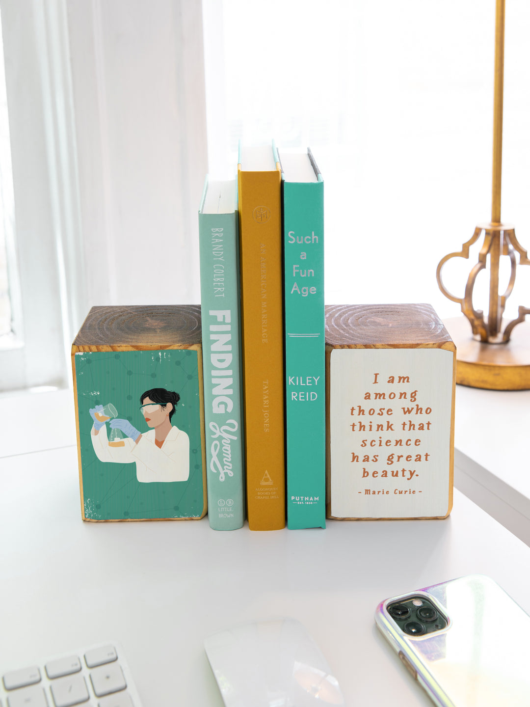 woman scientist with beaker illustration and Marie Curie quote, "I am among those who think that science has great beauty." on wood bookends