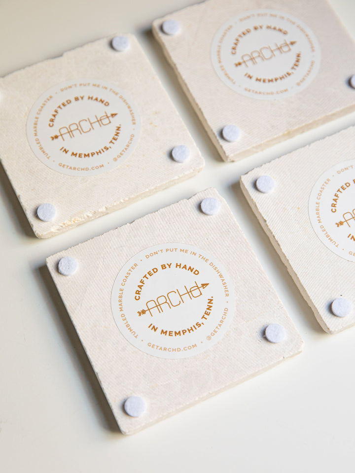 back view of coasters with sticker label and padded feet